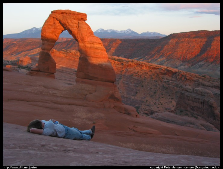 relaxing at Delicate Arch