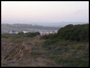 random tightly-packed homogenous oceanside dwellings near South San Francisco
