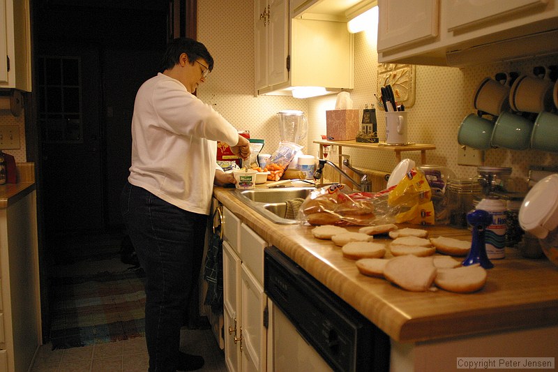 Charles' mother preparing a wonderful dinner