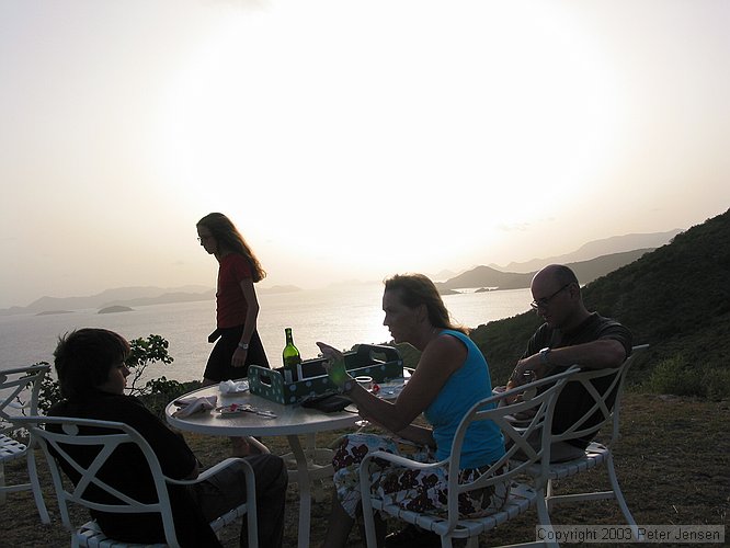 cool family having wine at sunset on Peter Island that we briefly visited with