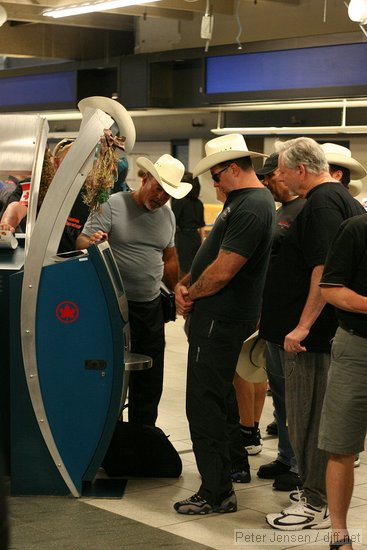 group of cowboys from the Calgary Stampede who sat in front of us on the flight to Toronto