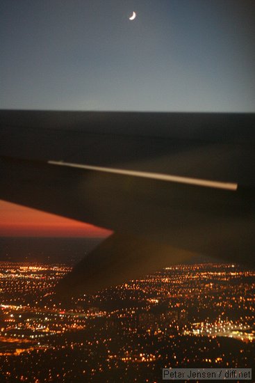 moon and wing over Toronto on departure