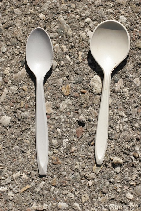 normal spoon (on the right) and extra spoon Charles found on the ground at a lunch site