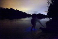 Erik stirring up some bioluminescent algae as he pulls his kayak out. Many thanks for borrowing and transporting a kayak for us!
