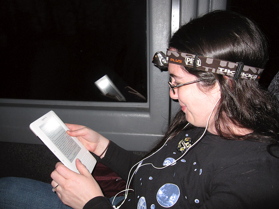 the bus lights are pretty far away and didn't illuminate the Kindle as well as she wanted