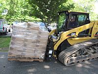 just your standard Cat 277B skid-steer hauling a load of ~1300 wine glasses