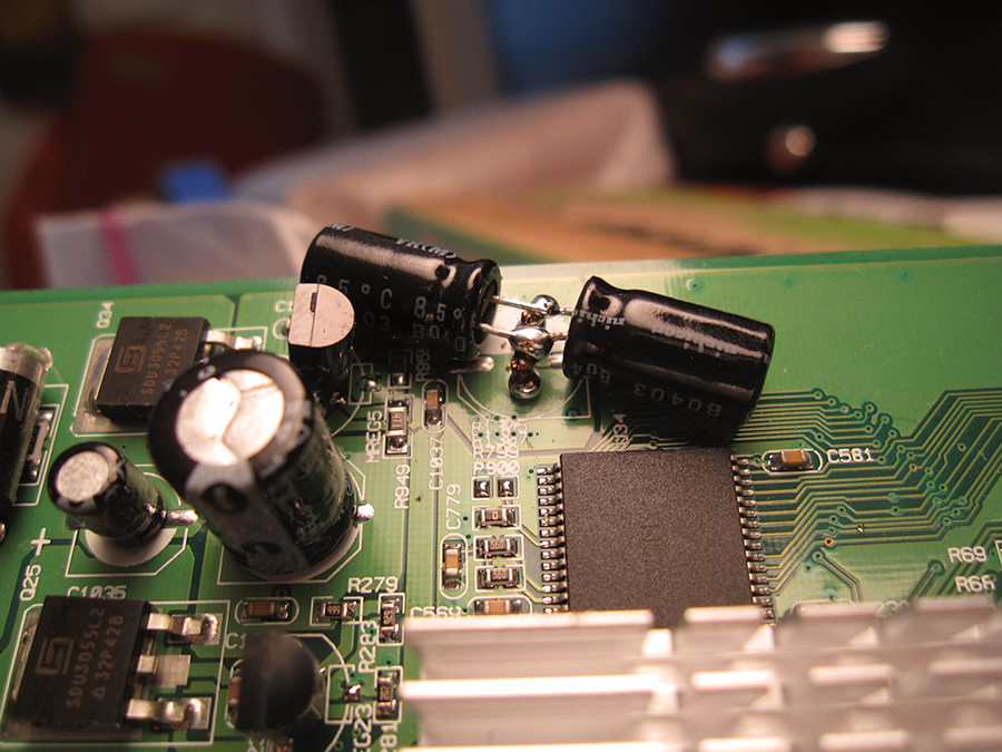 quick fix for a 470uF cap that got knocked off a video card - 2x 220uF donated by another board