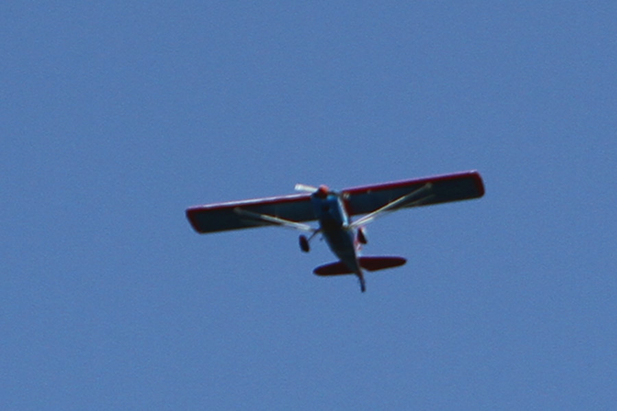 Citabria? doing aerobatics for us over the bay