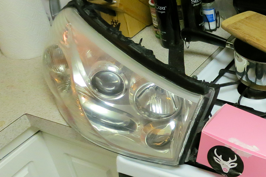 Saturn headlights after - much improved, but I ran kind of short on sanding pads