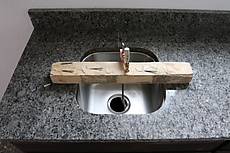 how sinks get sealed in place