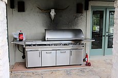 mega-grill requires both 110VAC and a propane connection