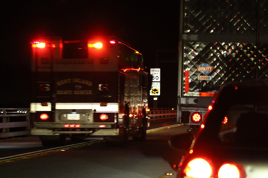 ambulance responding to wreck across bridge