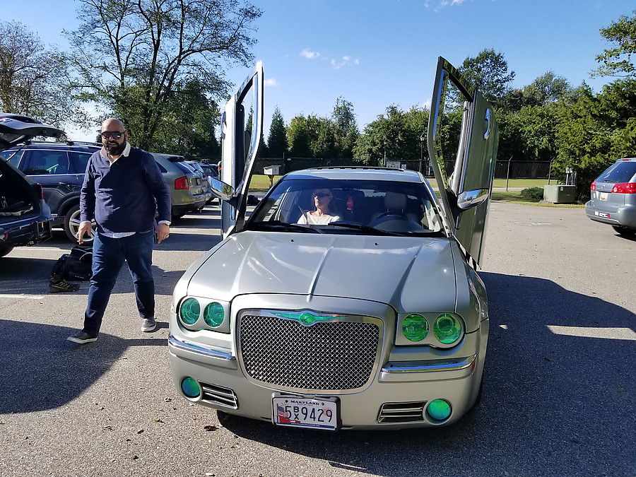 cool dude showing me the Bentley doors on his vehicle 