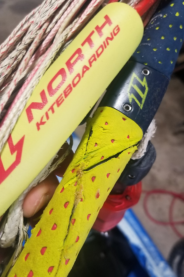 kiting is dangerous - the clean slits on the bar padding you can see were caused when the lines got wrapped after an inversion in fluky wind. It took a great deal of force to remove the lines from the bar.