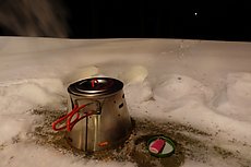 cooking dinner over an alcohol stove