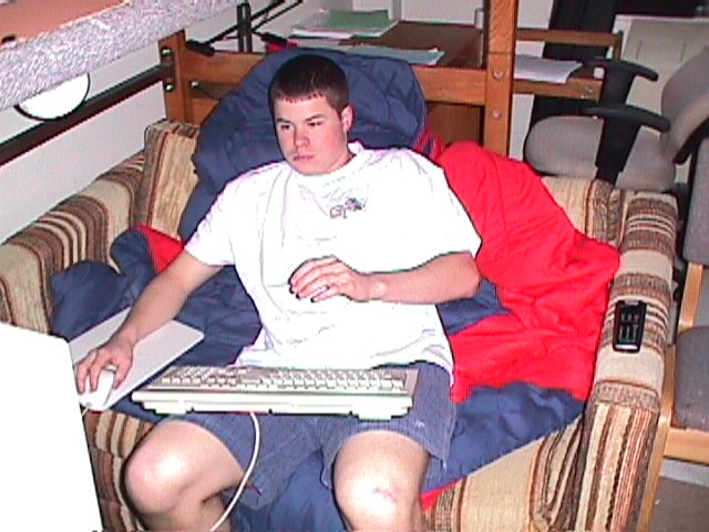 brian on the couch and computer