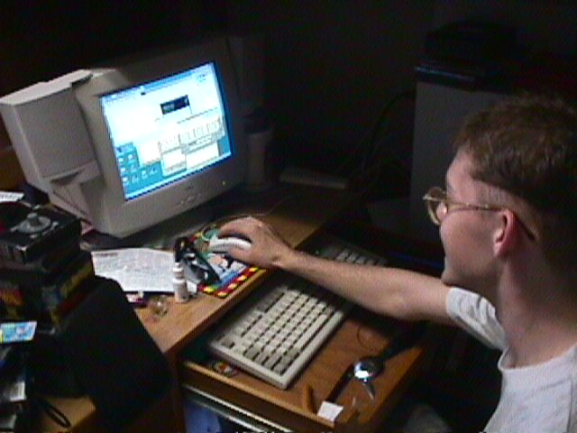 greg at his desk