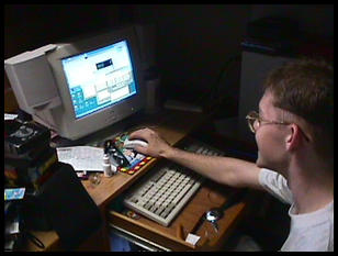 greg at his desk