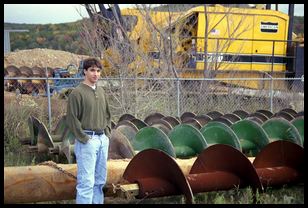 Jacob next to giant screws