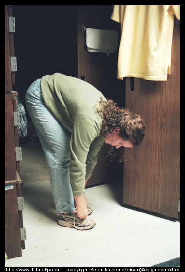 Melissa ties her shoe