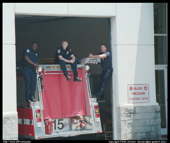 firemen watching parade