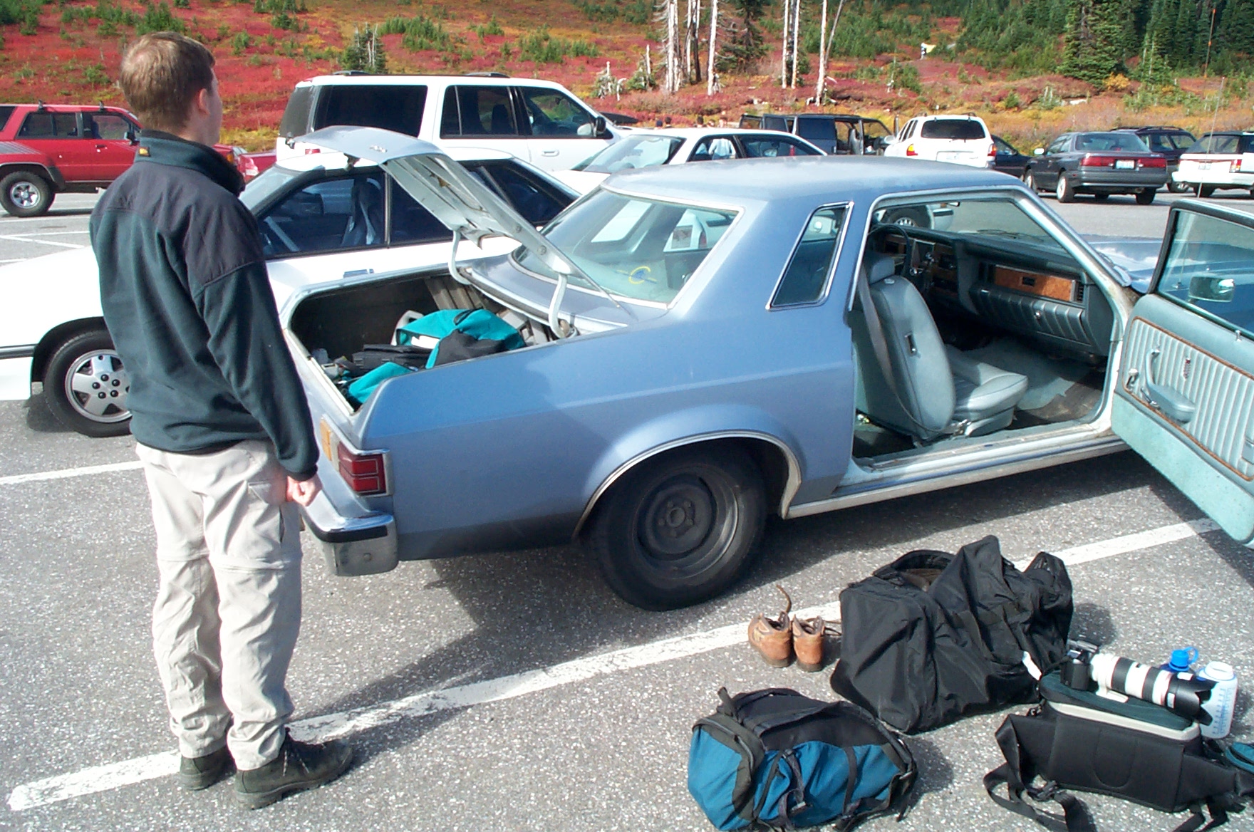 Charlie surveys the car and gear before we head out