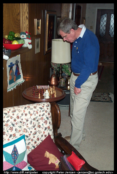 Dad plays chess with himself