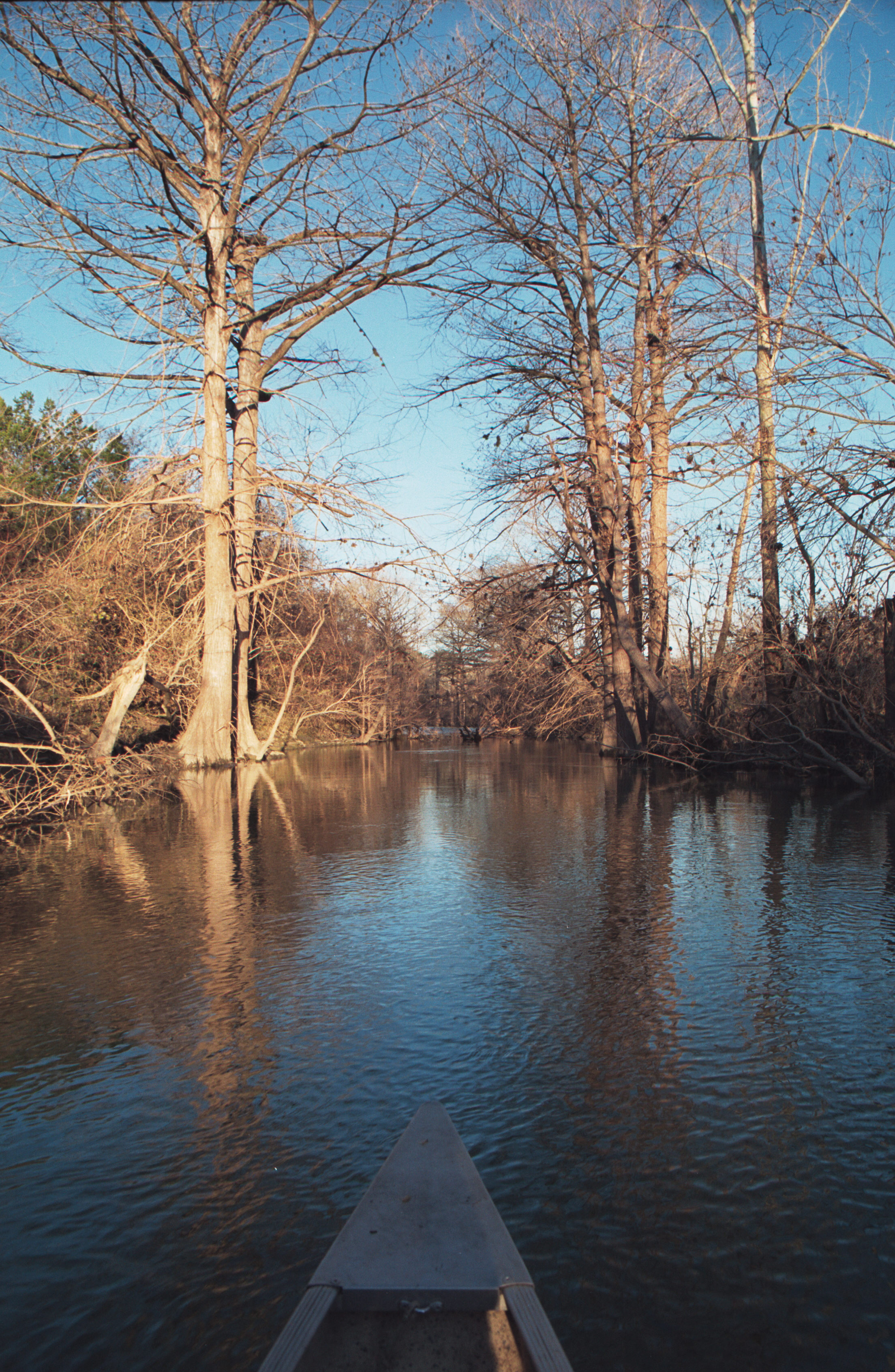 Onion Creek and canoe