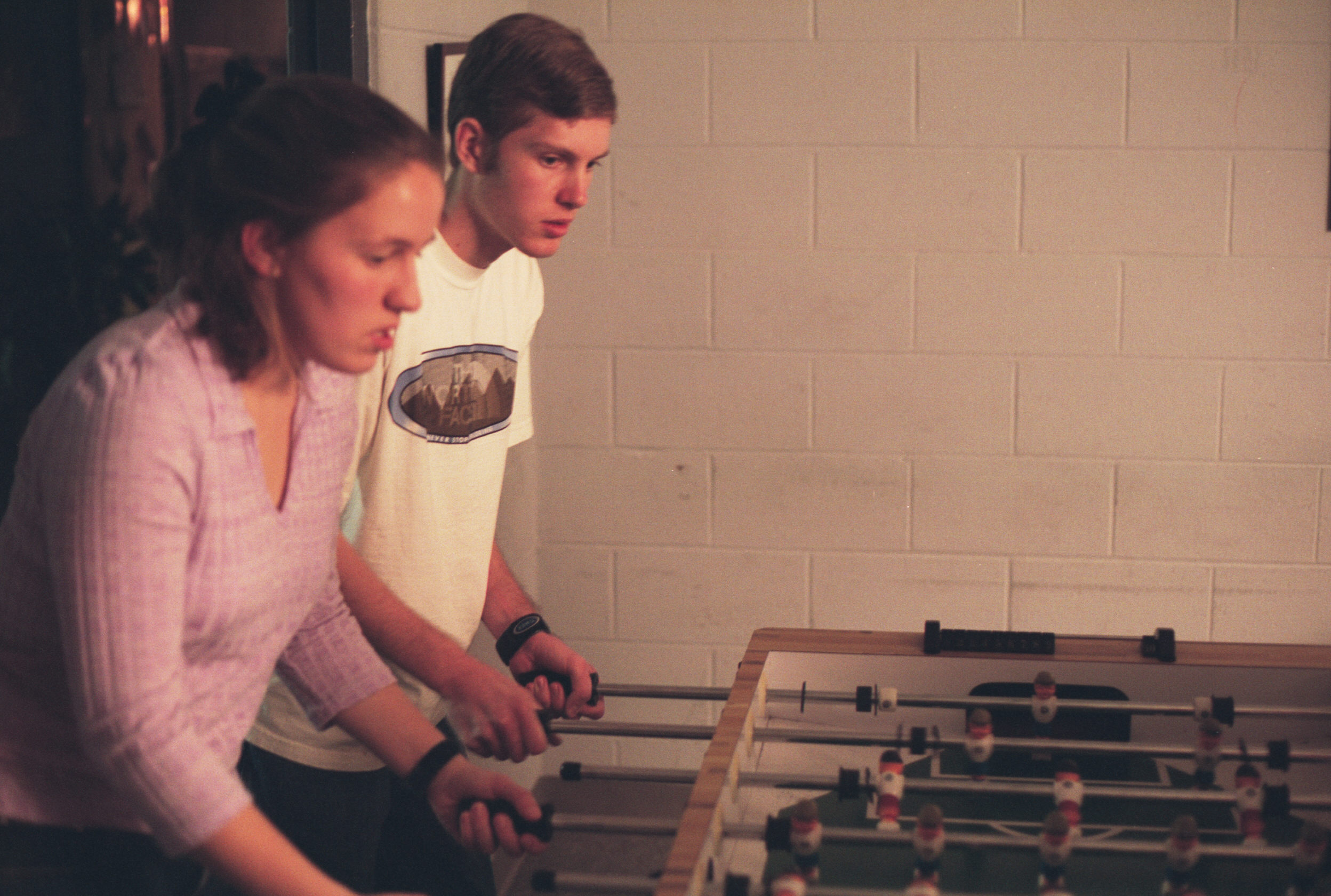 Kim and Tim play foosball