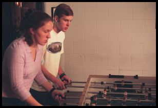 Kim and Tim play foosball