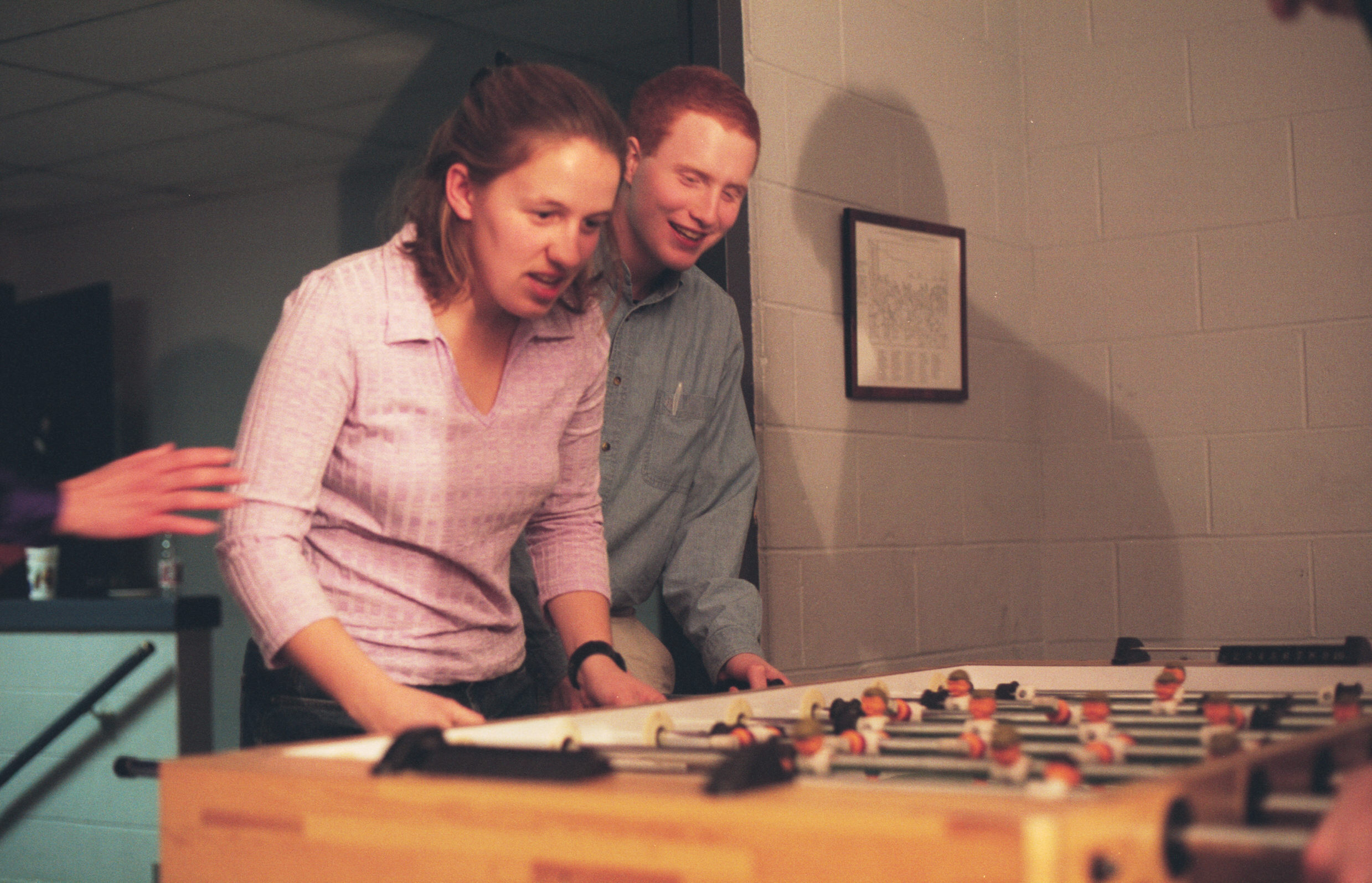 Kim and Frank play foosball
