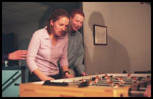 Kim and Frank play foosball