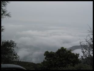 looking down out over the clouds