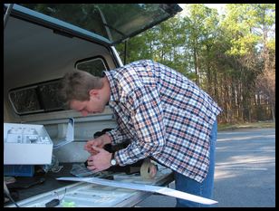 putting the last touches of packing tape on the wing