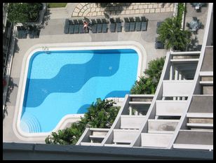 pool with lone sunbather