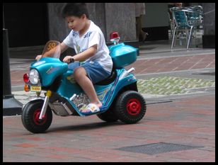 kid on scooter