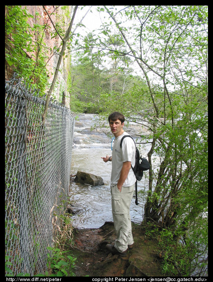 Charles on the creek side of the mill