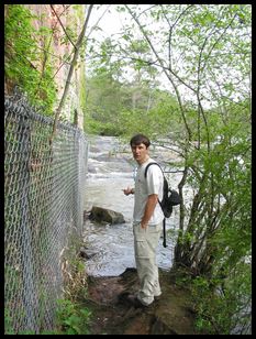 Charles on the creek side of the mill