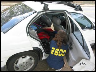 Blair, unloading the car