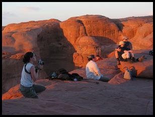 photographers and viewers of the arch