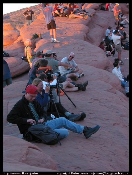 photographers and viewers of the arch