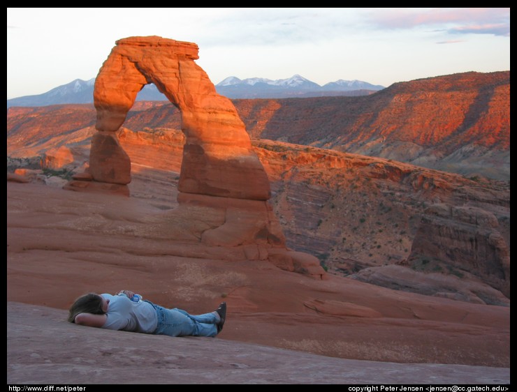 relaxing at Delicate Arch