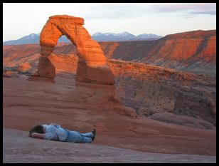 relaxing at Delicate Arch