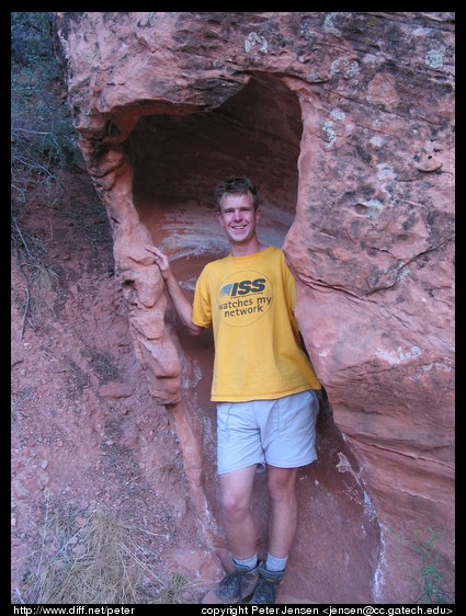 Peter in a neat sandstone formation in a wash we hiked down