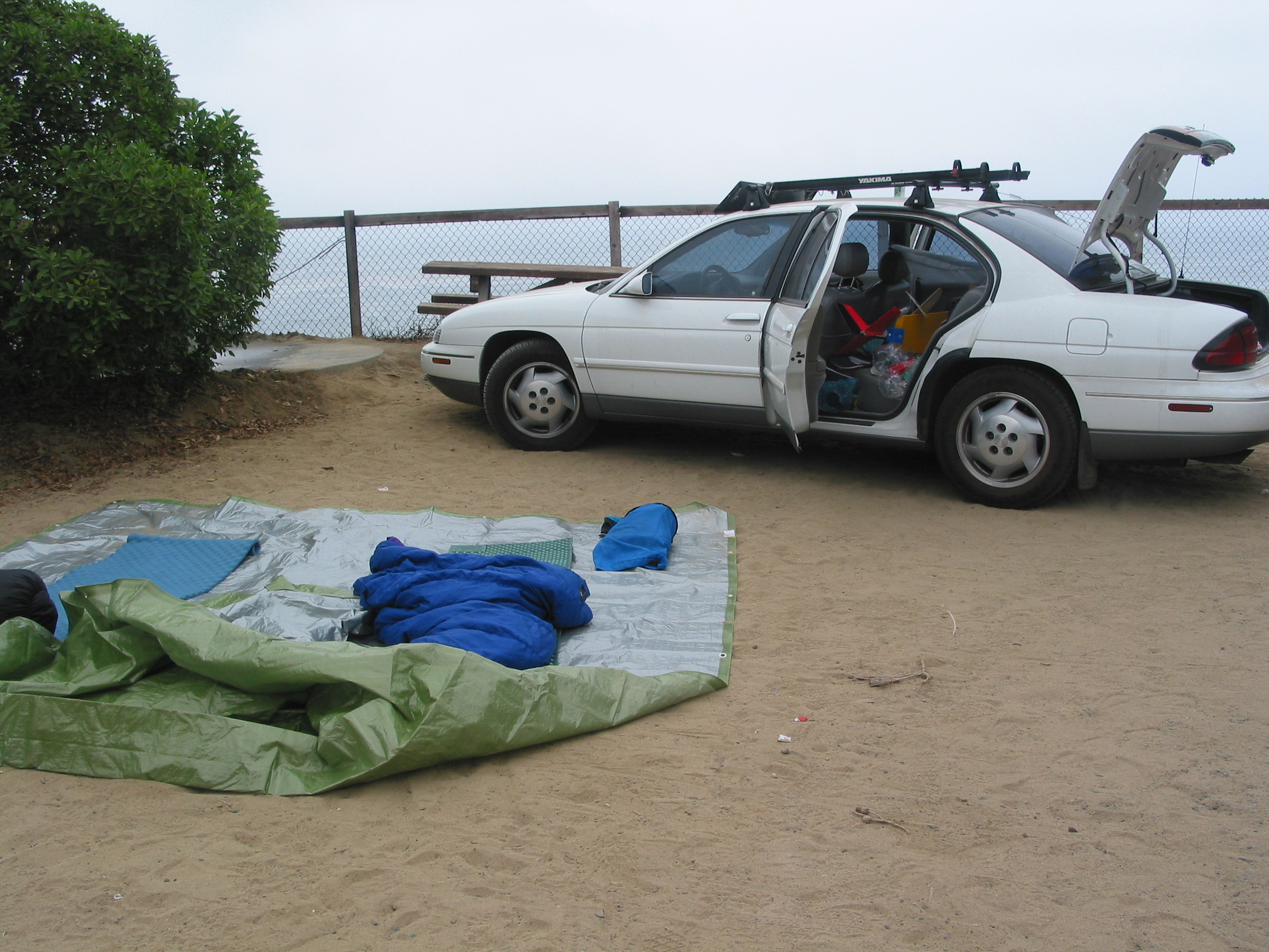 our sleeping arrangements and the car, positioned as somewhat of a windbreak