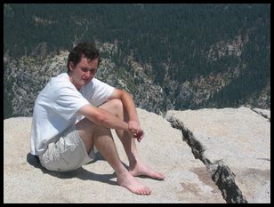 John, resting with unshod feet