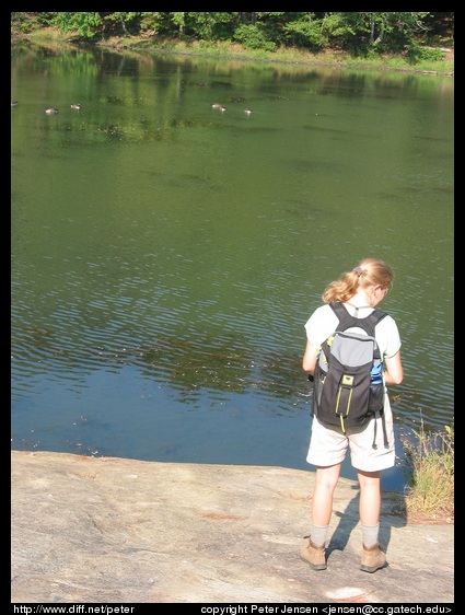 Laura contemplating the pond