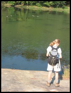 Laura contemplating the pond