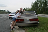 Meghan and Jessica with Kim's car on I75N near 285 after it died on Doug during the rain