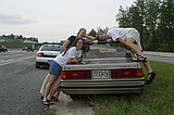 Meghan, Jessica, and Peter on Kim's car